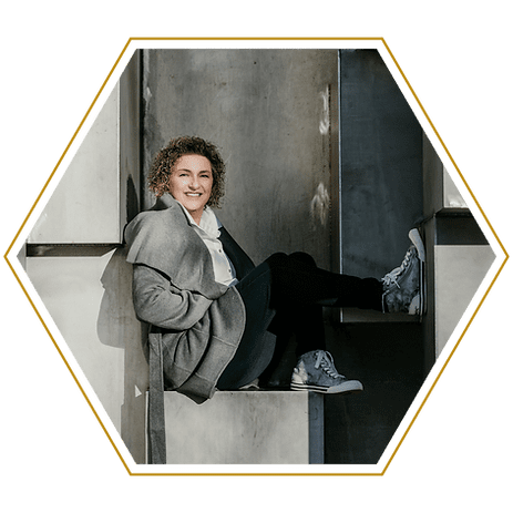Person sitting on modern staircase