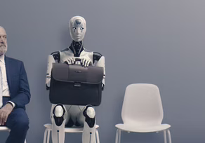 Robot with briefcase beside man in suit