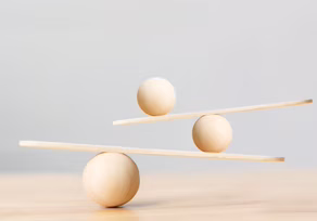 Balancing wooden spheres and sticks