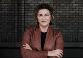 Woman smiling in professional attire